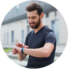 man looking at watch